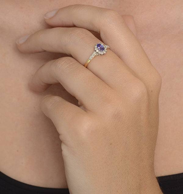 Tanzanite 5 x 3mm And Diamond 9K Gold Ring
